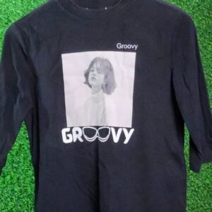 “Groovy Black Graphic Tee for Women – Retro Vibes”