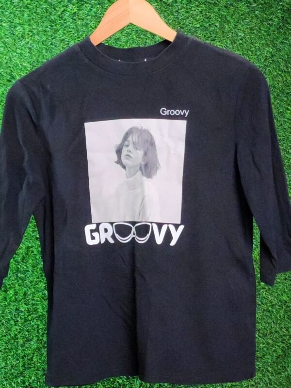 “Groovy Black Graphic Tee for Women – Retro Vibes”